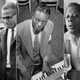 Martin Luther King Jr. and Malcolm X; Nat King Cole; James Baldwin
Wikimedia Commons; Wikimedia Commons; Ralph Gatti/Getty Images